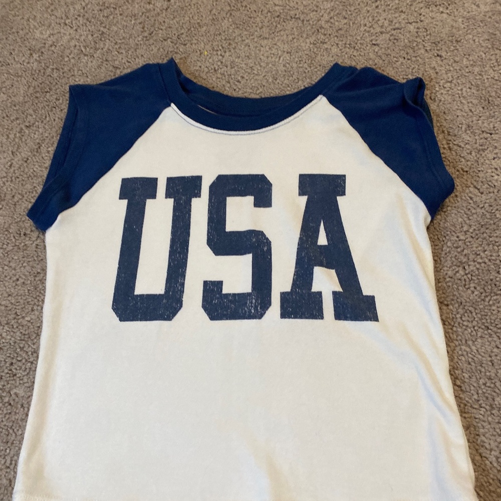 A navy blue and white tank top USA  shirt